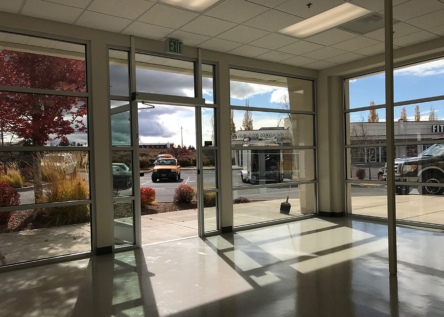 The entryway of Redmond DMV floor to ceiling windows line the walls